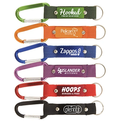 What is included in the design service for the carabiner keychains?